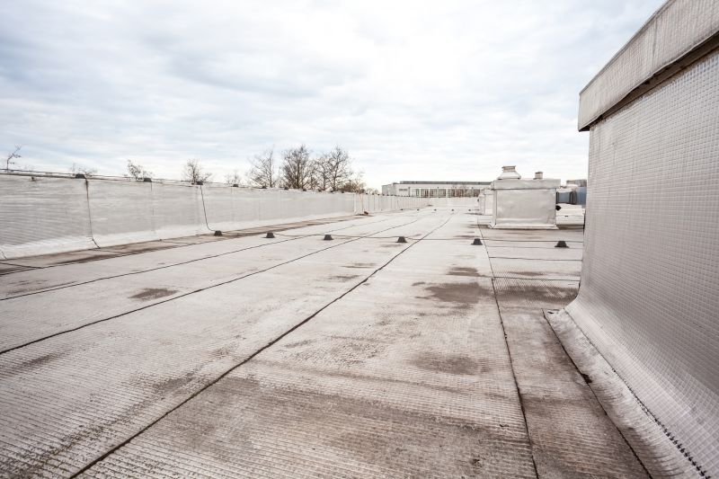 Flat Roof Repair After Storm Or Wind Damage